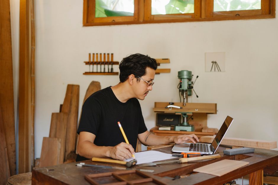 Furniture designer drafting bespoke interiors